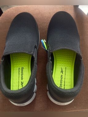 Reebok Black Slip-On Sneakers with Neon Green Insoles